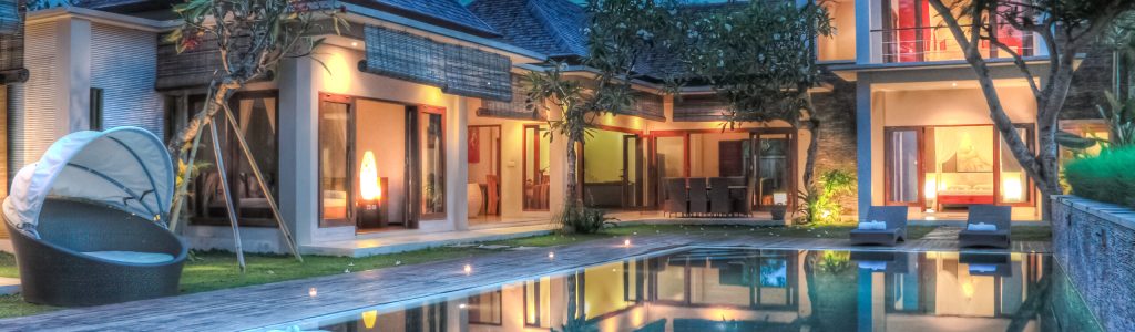 Tropical modern villa A modern tropical villa at sunset